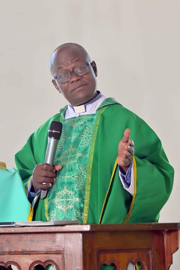 The parish priest preaching